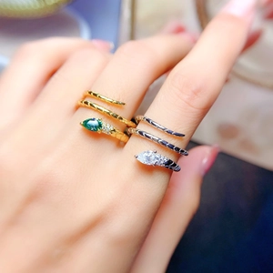 Elegant snake-shaped wrap ring with teardrop moissanite stone in gold and silver finish