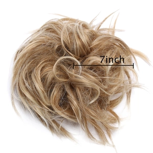 Close-up of 7-inch messy curly golden brown hair bun extension with texture detail