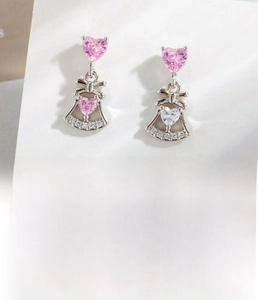 Detail of silver bell earrings with pink heart zircon and 0.8x6mm surgical steel bar
