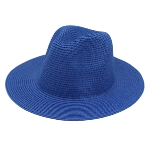 Top view of blue Panama straw hat showing fine spiral weaving and flat brim detail