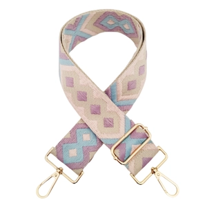 Detail of adjustable geometric diamond pattern wide bag strap with gold metal lobster hooks
