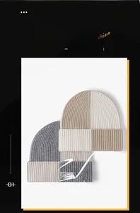 Close-up of color-block knitted wool beanie showing the vertical ribbed stitch texture