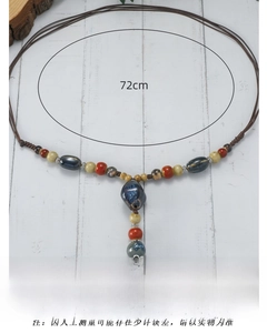 Detailed specs of handmade ceramic necklace with beads and 72cm braided cord strap
