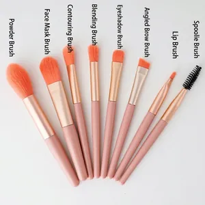 8-piece mini makeup brush set for beginners with orange bristles and pink handles