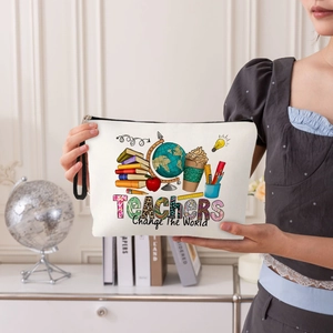Linen makeup bag for teachers with colorful globe and book print and wrist strap