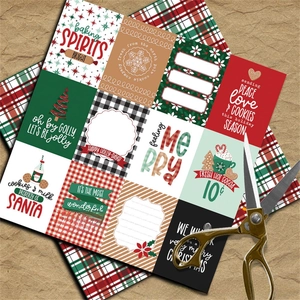 Detail of Christmas themed scrapbook paper with festive patterns and vintage gold scissors