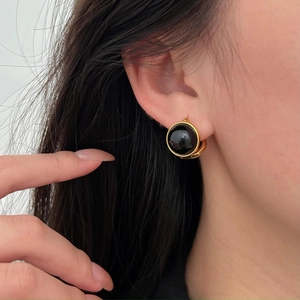 Minimalist 925 silver stud earrings with black onyx inlay and gold plated metal frame