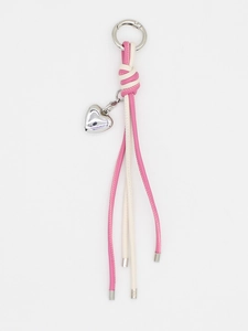Detail view of woven pink and white leather heart keychain with polished silver metal clasp