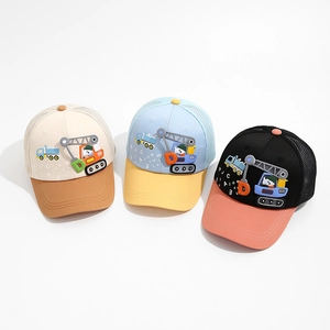 Detail of mesh back panels on cartoon crane baseball caps for kids' breathability