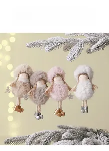 Detail view of plush angel tree ornaments with soft fur and sparkling festive accessories