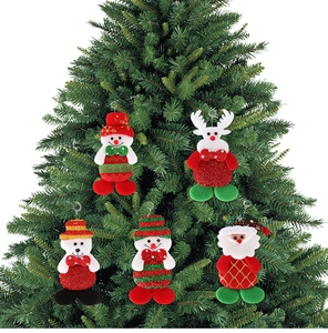 Close-up of festive fabric dolls including Santa and Snowman hanging on a green Christmas tree