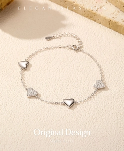 Detailed macro view of S925 sterling silver heart bracelet with sparkling pavé zircons
