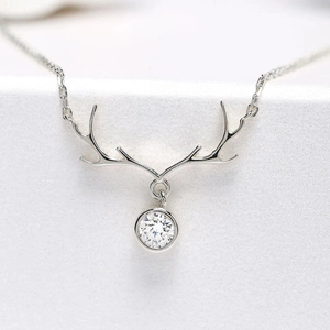 Elegant 925 silver necklace with reindeer antler pendant and sparkling zircon stone