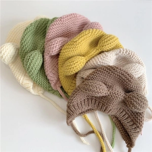 Winter baby knit hat with bear ears and chin straps in multiple soft pastel colors