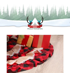 Detail of red and black buffalo plaid Christmas tree skirt with burlap lace trim