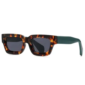 Retro square tortoiseshell sunglasses with dark green temples and grey lenses