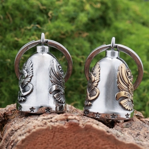 Macro shot of stainless steel eagle motorcycle bells with Live to Ride engraving detail