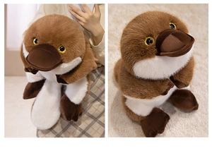 Close-up showing the soft plush texture and realistic brown platypus stuffed animal toy