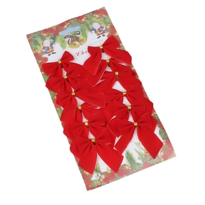 Set of 12 red velvet Christmas bows with gold ties on a festive card board display