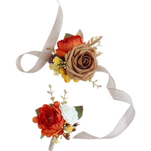 Handmade bridal wrist corsage and groom boutonniere set in burnt orange and white floral