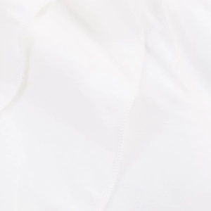 Macro view showing the breathable and smooth texture of white cotton blend shirt fabric