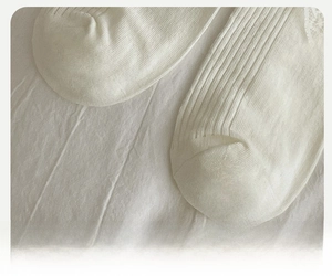 Detail of reinforced sock toe and vertical ribbed texture on white cotton Lolita socks