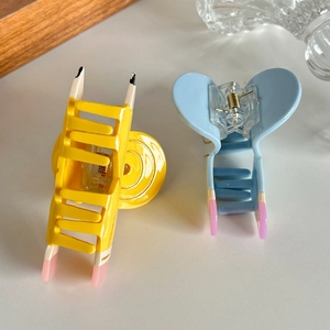 Cute acetate pencil hair claws in yellow and blue with colorful patchwork tips