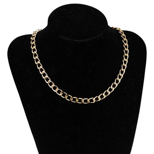 Flat six-sided 1m golden Cuban link chain necklace displayed on a black bust model