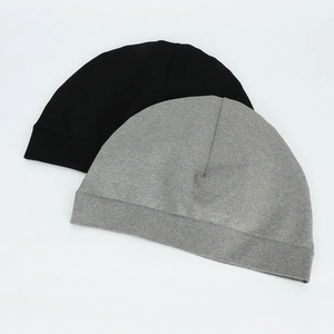 Outdoor knitted running beanie hats in black and grey marl with ribbed elastic texture