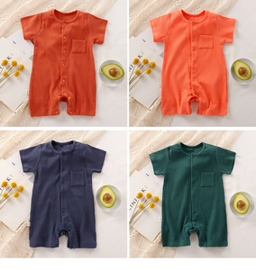 Detail of short sleeve baby rompers in rib fabric with front snaps and chest pocket