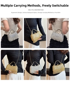 Detailed view of rhinestone and pearl evening bag with tiered fringe and chain strap