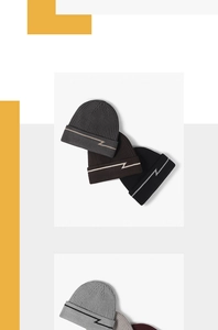 Detailed knit texture and ribbed patterns of multi-colored winter beanies with stripe accents