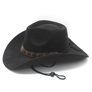 Detail of black wool felt cowboy hat with leather band, vintage metal badge and chin cord