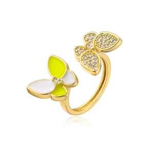 Detail of 18K gold butterfly ring with white zircons and green enamel finish