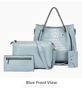 Detailed four-piece light blue tote bag set with crocodile pattern and matching wallets