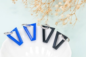 Minimalist geometric inverted triangle earrings with blue and black enamel details