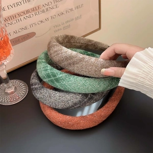 Chic padded wool headbands in brown green grey and orange colors for women