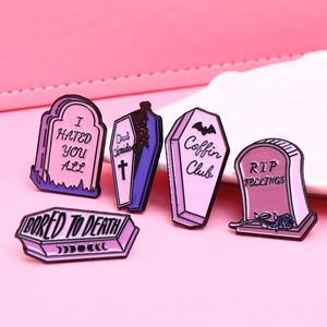 5-piece gothic enamel pin set with pink and purple tombstones and coffin designs