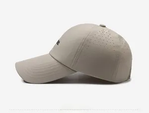 Detail view of quick-dry baseball cap featuring breathable laser-cut holes and side logo