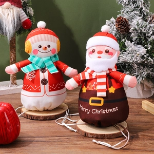 Christmas drawstring gift bags featuring cartoon Santa and Snowman for holiday treats