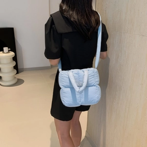 Light blue quilted down shoulder bag for women with fluffy texture and large capacity