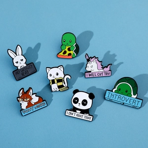 Close-up of 7 colorful cartoon animal enamel pins with English slogans on a blue background