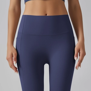 Close-up of high-waisted yoga leggings in navy blue with functional side pockets