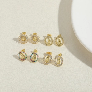 Detail of 14K gold plated Virgin Mary earrings set with sparkling zircon and gemstones
