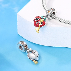 Silver Halloween heart charms with Trick or Treat engraving and golden key detail