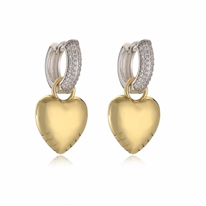 Elegant gold heart pendant earrings with silver micro-paved rhinestones on white background