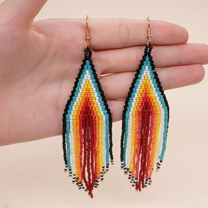 Bohemian multicolored seed bead tassel earrings with geometric weave and gold hooks