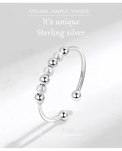 Close-up of S925 sterling silver beads with polished and frosted finishes on ring band