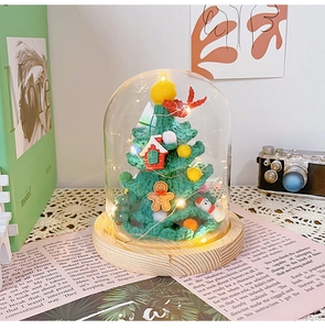 Handmade crochet Christmas tree in glass dome with LED lights and wooden base