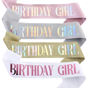 Detail view of glitter Birthday Girl sashes in pink, silver, gold and white fabrics